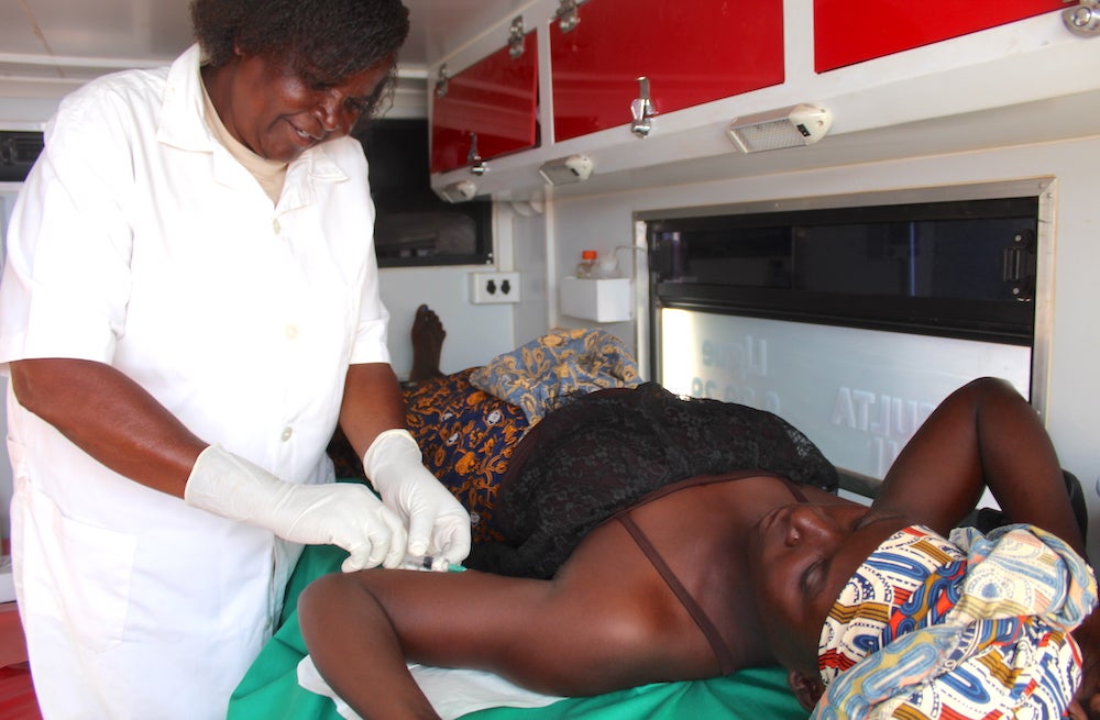 a dentist examining a patient