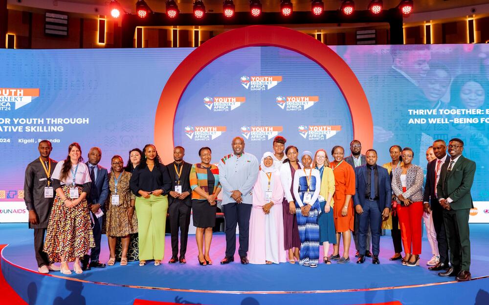 Group of high-level plenary participants smile during the YouthConnekt Africa Summit.