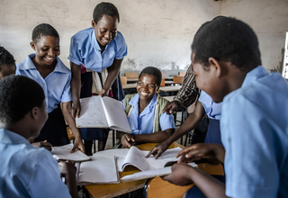 Lusita and her friends attend a class at Katewe Community Day Secondary School in Katewe, near Dedza.