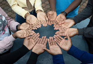 Hands together for World AIDS Day.