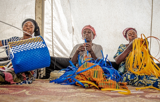Women learn basket production at a safe space at Bulengo camp for internally displaced persons in North Kivu, DRC.