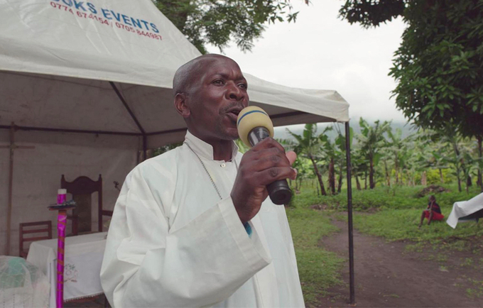 Village health team member Timothy Mbene Masereka shares information about gender-based violence among his community.