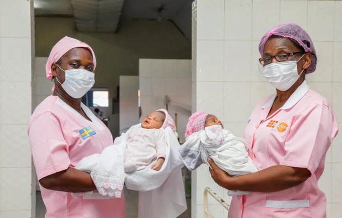 Midwives Lucie Banionia and Lydie Mawelo help deliver the future at the General Reference Hospital in Kinshasa, DRC.