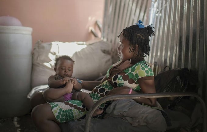 Haiti – Lumilene, 15, lives with her parents and her 6-month-old daughter in a camp for people displaced by the earthquake that