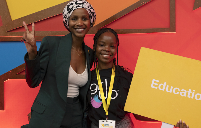 Shudu Musida with a young girl at the Women Deliver conference in Rwanda earlier this year.