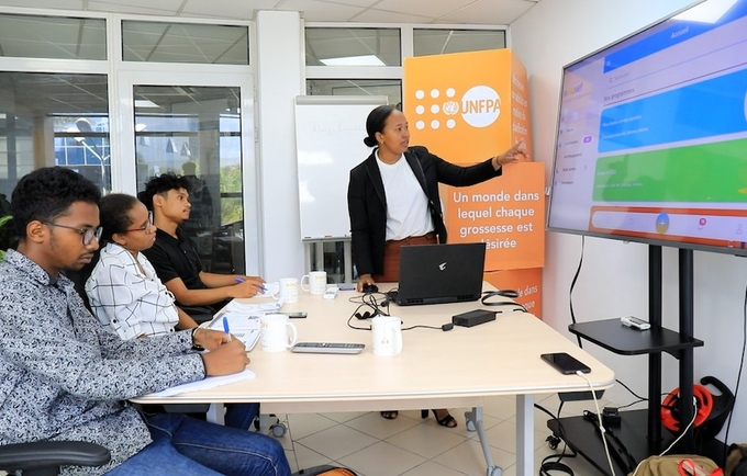 Young people using UNFPA's newly launched Innovation Room for the first time.