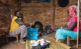 In Ethiopia’s Benishangul-Gumuz region, Gebeyanesh Gebinet and a friend go through the items of a UNFPA dignity kit.