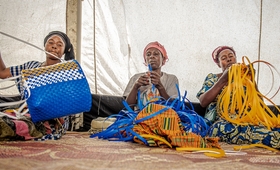 Women learn basket production at a safe space at Bulengo camp for internally displaced persons in North Kivu, DRC.