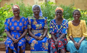 Four women smiling, Zimbabwe.