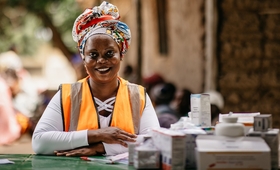 Pharmacist Cristina administers medication at a mobile brigade in Cabo Delgado, Mozambique.