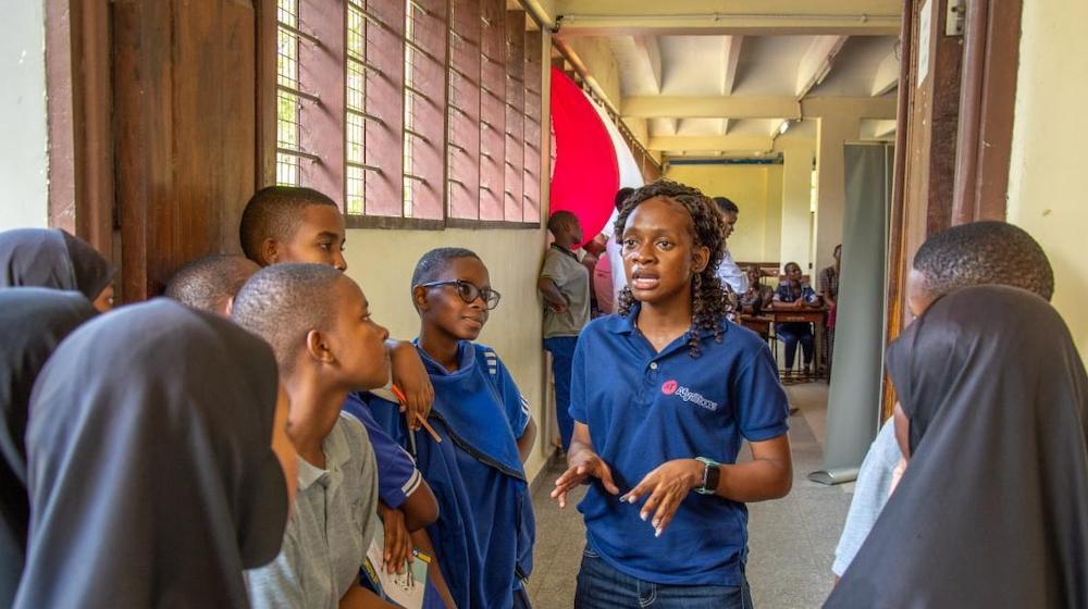 Afyatoon members meeting with girls from a secondary college in Tanzania.