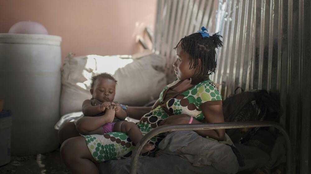 Haiti – Lumilene, 15, lives with her parents and her 6-month-old daughter in a camp for people displaced by the earthquake that