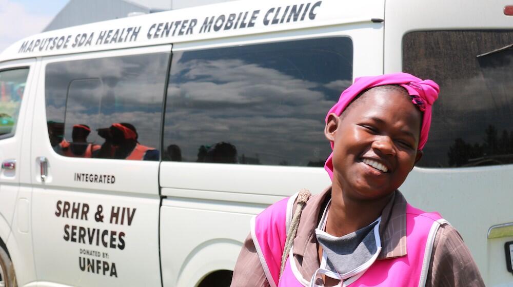 A factory worker accesses health services.