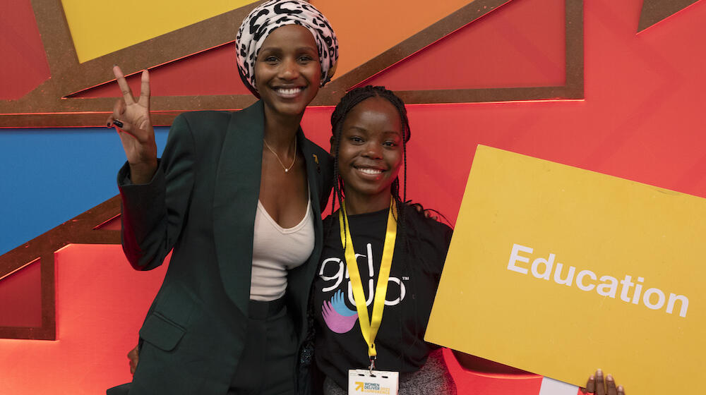 Shudu Musida with a young girl at the Women Deliver conference in Rwanda earlier this year.