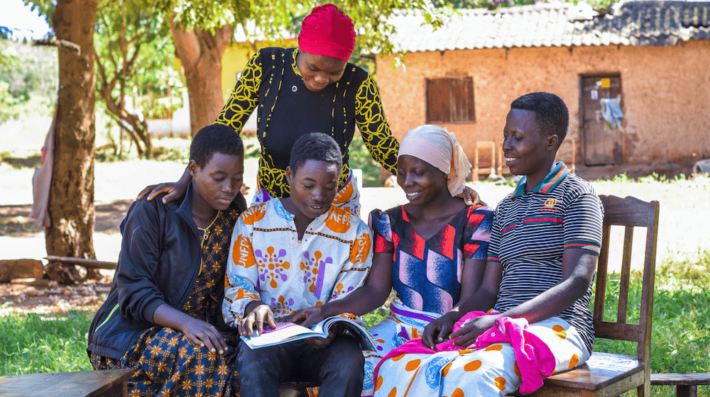 Melania Zambiliti (standing) with members of the Upendo group.