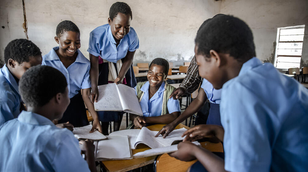 Lusita and her friends attend a class at Katewe Community Day Secondary School in Katewe, near Dedza.