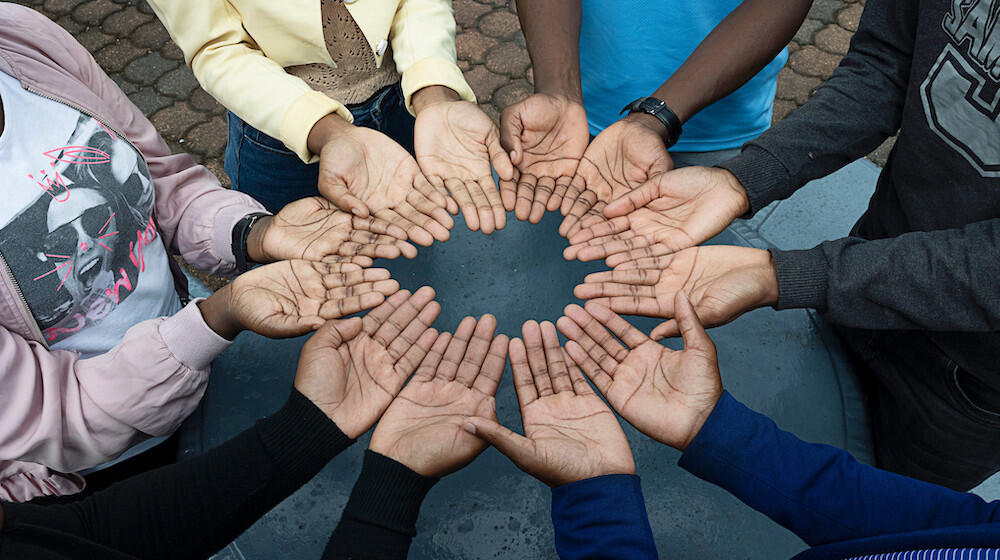 Hands together for World AIDS Day.